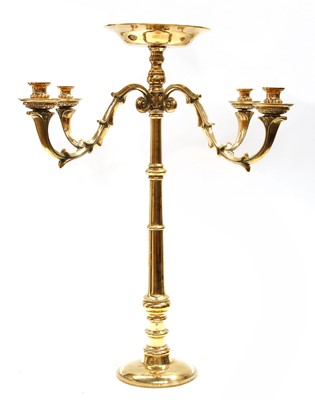 Lot 77 - A brass four-branch candelabrum