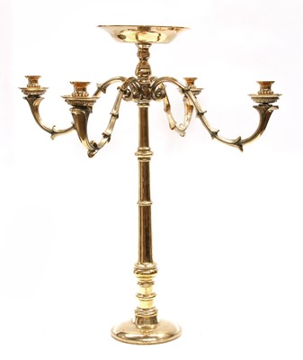 Lot 77 - A brass four-branch candelabrum