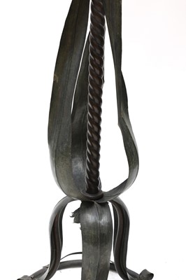 Lot 215 - A French Art Nouveau patinated metal standing lamp