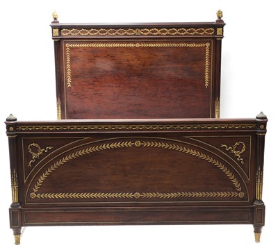 Lot 400 - A Louis XVI-style plum pudding mahogany double bed