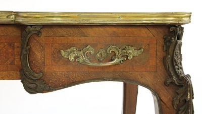 Lot 249 - A French Louis XV-style small kingwood bureau plat