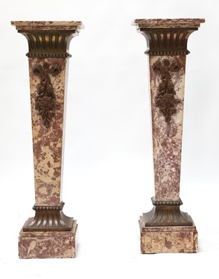 Lot 891 - A pair of Louis XVI-style pink marble pedestals