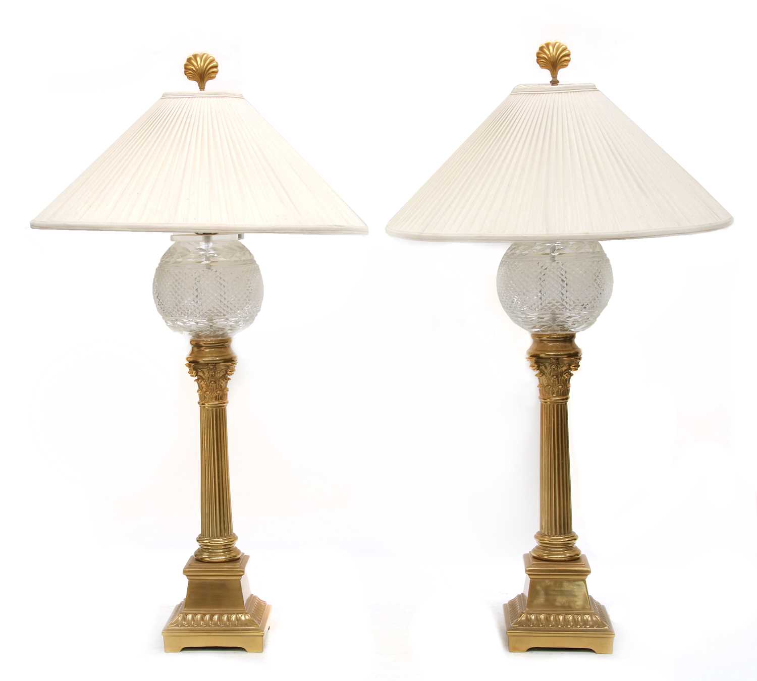 Lot 72 - A pair of gilt brass and glass table lamps