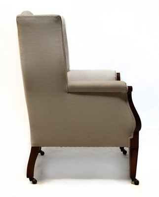 Lot 73 - A mahogany wingback armchair