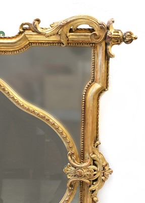 Lot 46 - A large giltwood and gesso overmantel mirror