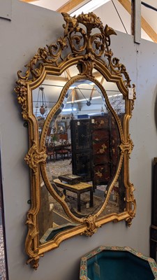 Lot 46 - A large giltwood and gesso overmantel mirror
