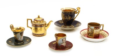 Lot 160 - A collection of Vienna cabinet cups and saucers and a miniature teapot
