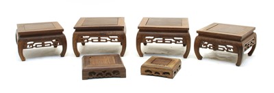 Lot 310 - A collection of Chinese wood stands