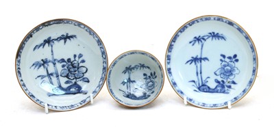 Lot 116 - An 18th century Nanking cargo blue and white tea bowl and two saucers