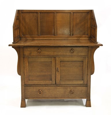 Lot 188 - An Arts and Crafts oak cabinet