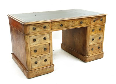 Lot 488 - An Edwardian pale walnut partners desk