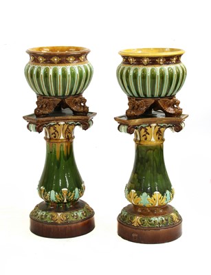 Lot 6 - A pair of Doulton Lambeth stoneware jardinières on stands