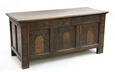 Lot 501 - A late 17th century and later carved oak coffer