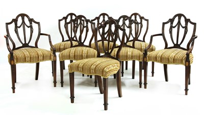 Lot 500 - A set of eight George III style Hepplewhite dining chairs