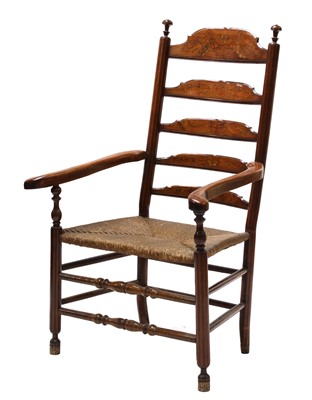 Lot 770 - A large fruitwood and parquetry ladder back elbow chair