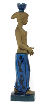 Lot 507 - A Royal Copenhagen glazed stoneware figure of a water carrier