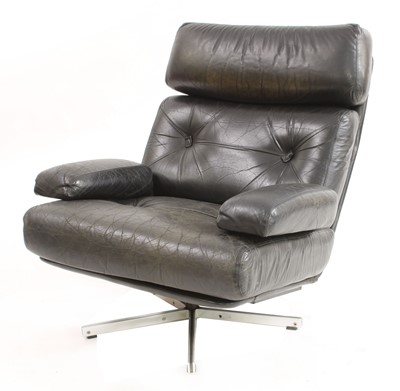 Lot 315 - A Tetrad 'Nucleus' black leather revolving lounge chair