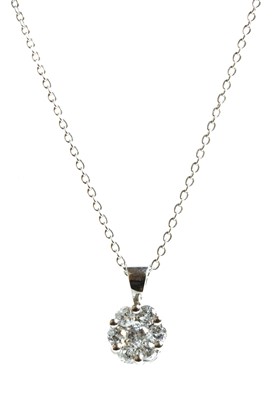 Lot 169 - A 9ct white gold diamond set cluster pendant