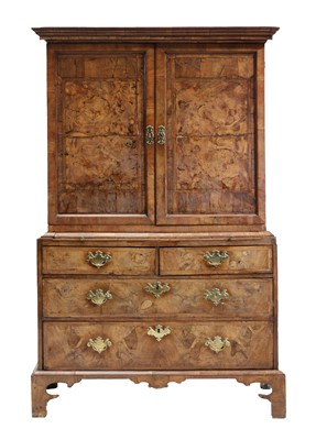 Lot 363 - A walnut and feather banded cabinet