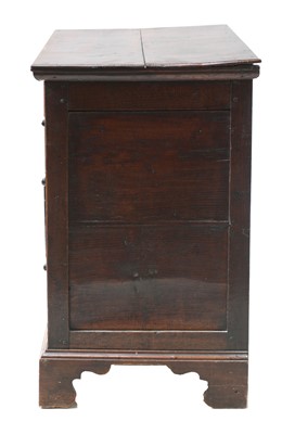 Lot 705 - A transitional oak chest of drawers
