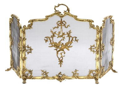Lot 836 - A French Louis XVI-style gilt brass triptych fire screen