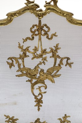 Lot 836 - A French Louis XVI-style gilt brass triptych fire screen