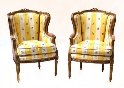 Lot 67 - A pair of French Louis XVI-style giltwood fauteuils