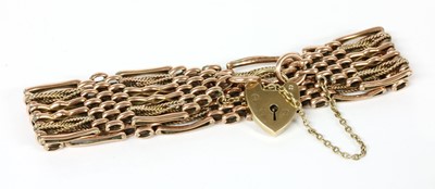 Lot 129 - A rose gold gate bracelet
