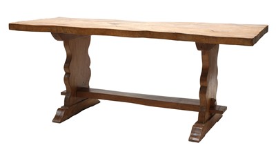 Lot 122 - An elm and walnut trestle table