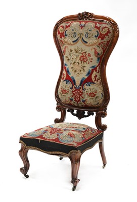 Lot 104 - A Victorian rosewood high-backed chair
