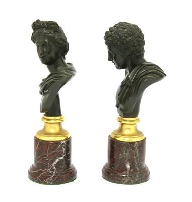 Lot 334 - A pair of Grand Tour bronze busts after the Antique