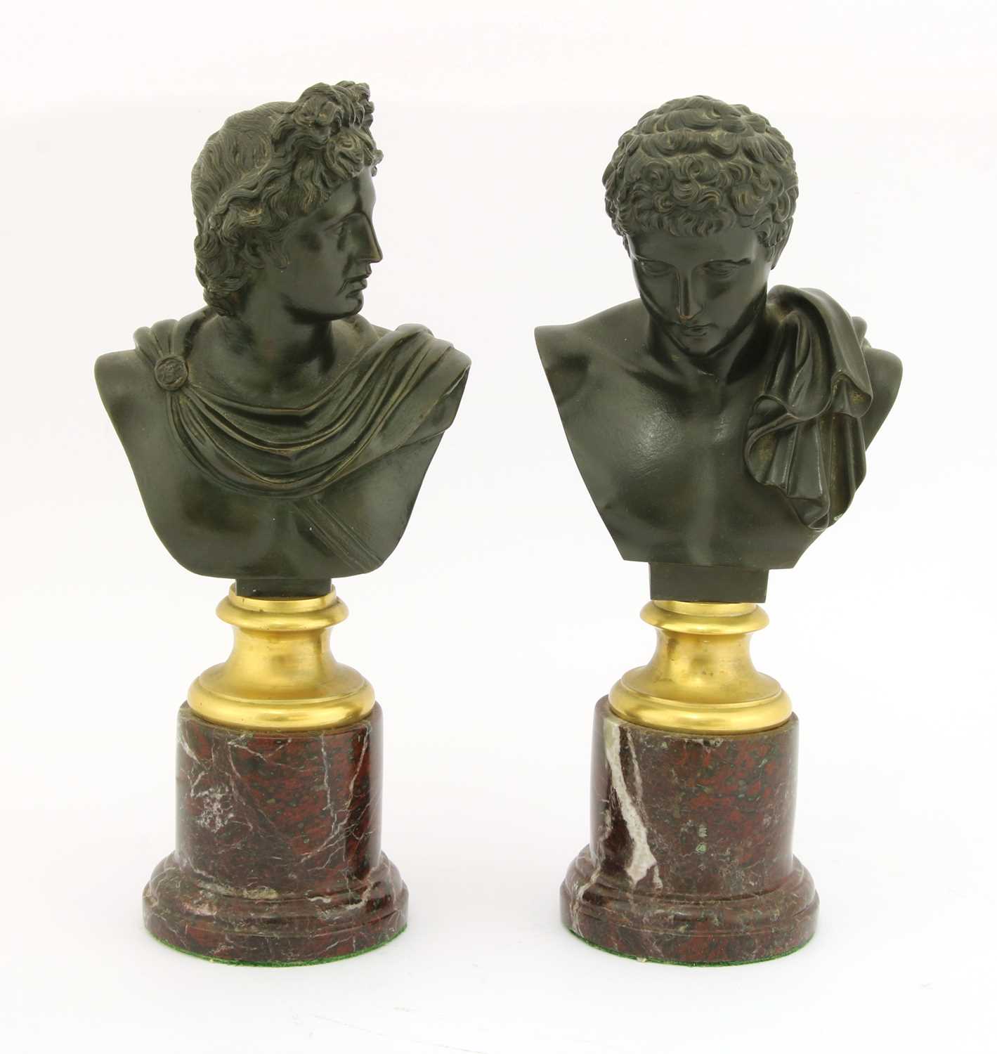 Lot 334 - A pair of Grand Tour bronze busts after the Antique