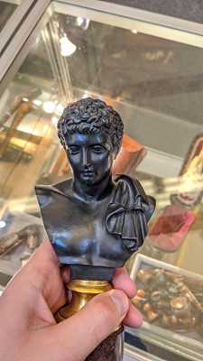 Lot 334 - A pair of Grand Tour bronze busts after the Antique