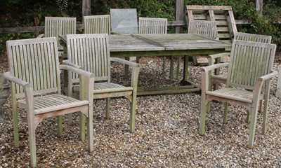 Lot 705 - Teak garden table and eight chairs