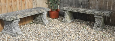 Lot 424 - A pair of weathered composite stone garden benches