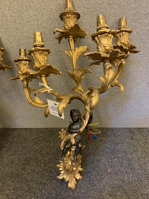 Lot 382 - A pair of Louis XV-style ormolu and bronze wall lights