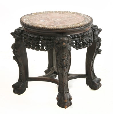 Lot 476 - A Chinese hardwood jardiniere stand