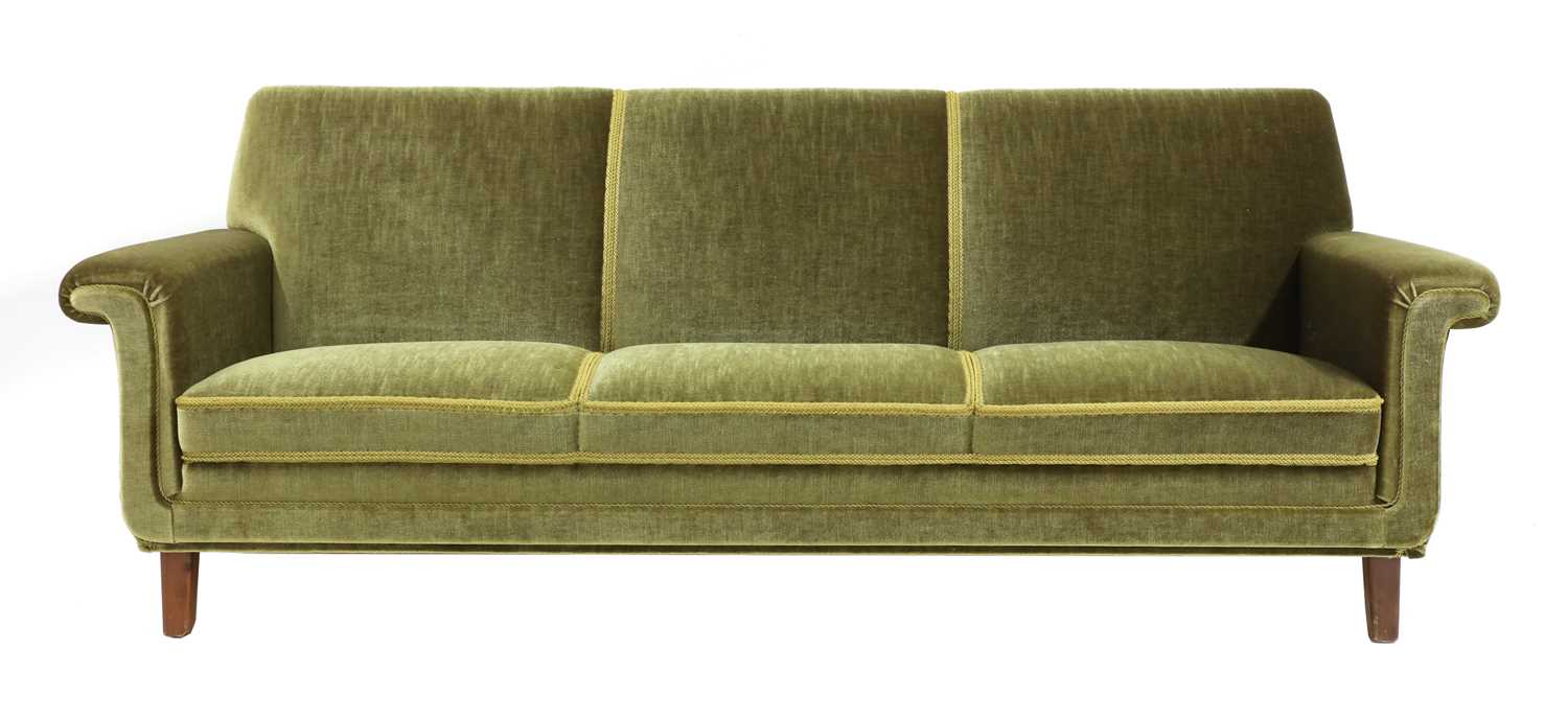 Lot 335 - A green velour three-seater settee