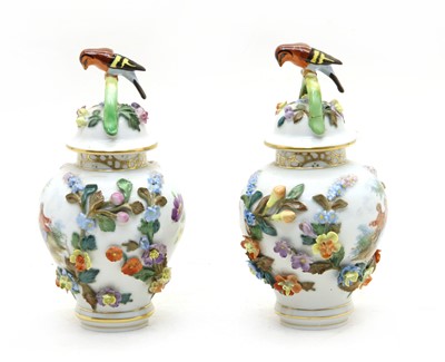 Lot 73 - A pair of modern Dresden floral encrusted vases and covers with bird finials (2)