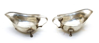 Lot 90 - A pair of early 20th century silver sauce boats