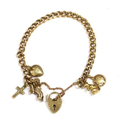 Lot 289 - A 9ct gold charm bracelet