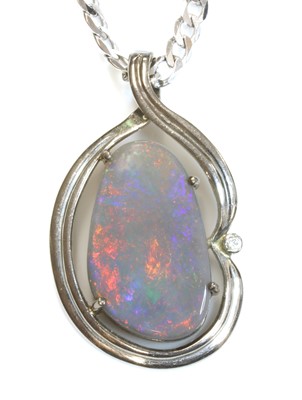 Lot 111 - A white gold, opal and diamond pendant