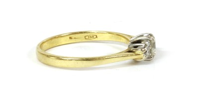 Lot 156 - An 18ct gold three stone diamond ring