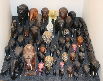 Lot 243 - A large collection of model elephants