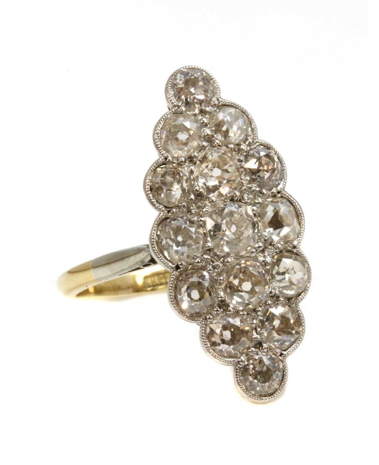 Lot 149 - A diamond set marquise cluster ring