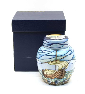 Lot 352 - A Moorcroft tubeline decorated 'Winds of Change' jar and cover