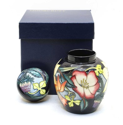 Lot 126 - A Moorcroft tubeline decorated ' Golden Jubilee' jar and cover