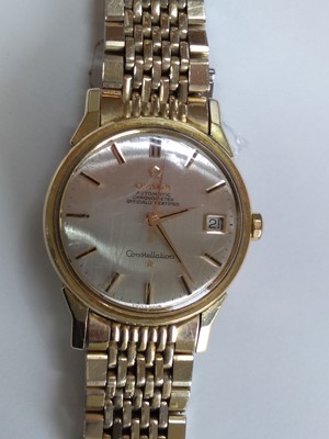 Lot 526 - A gentlemen's steel and gold-plated Omega 'Constellation' mechanical bracelet watch, c.1976