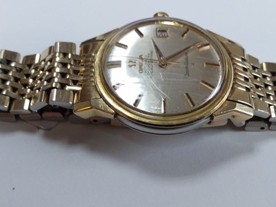 Lot 526 - A gentlemen's steel and gold-plated Omega 'Constellation' mechanical bracelet watch, c.1976