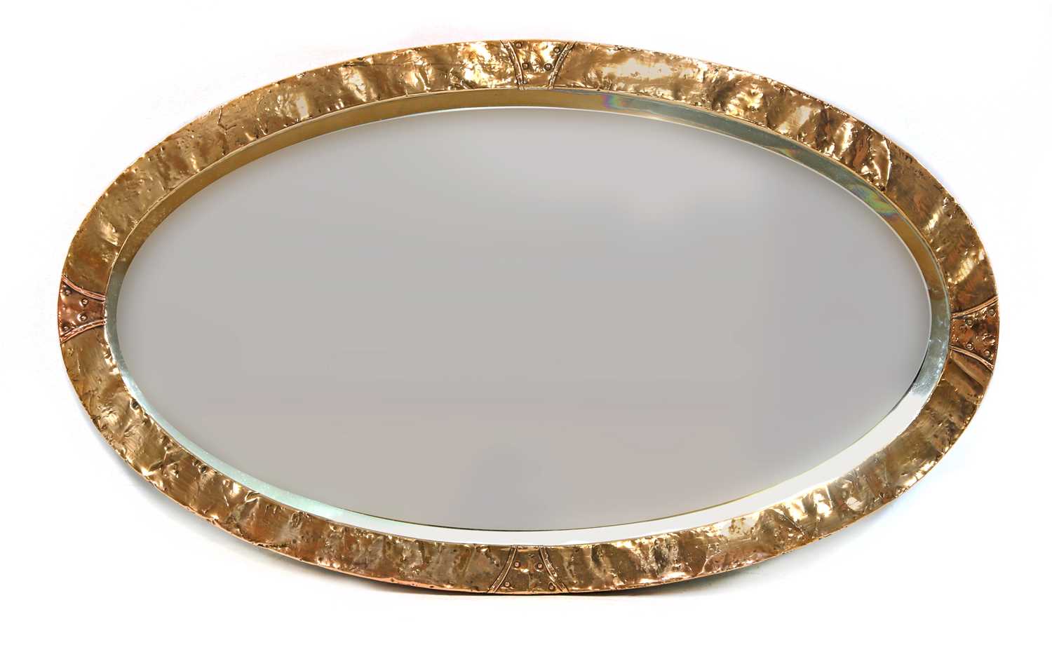 Lot 174 - An Arts and Crafts oval copper mirror